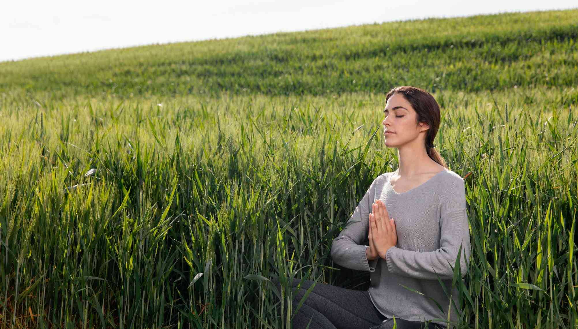 beautiful-woman-meditating-nature